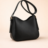 Minimalistyczna damska torebka typu crossbody z eleganckiej skóry wegańskiej